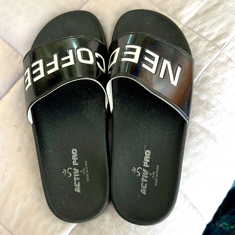 Beautiful black “need coffee” slides with indentations for your toes in excellen